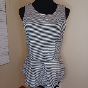 Peplum sleevless bateau top